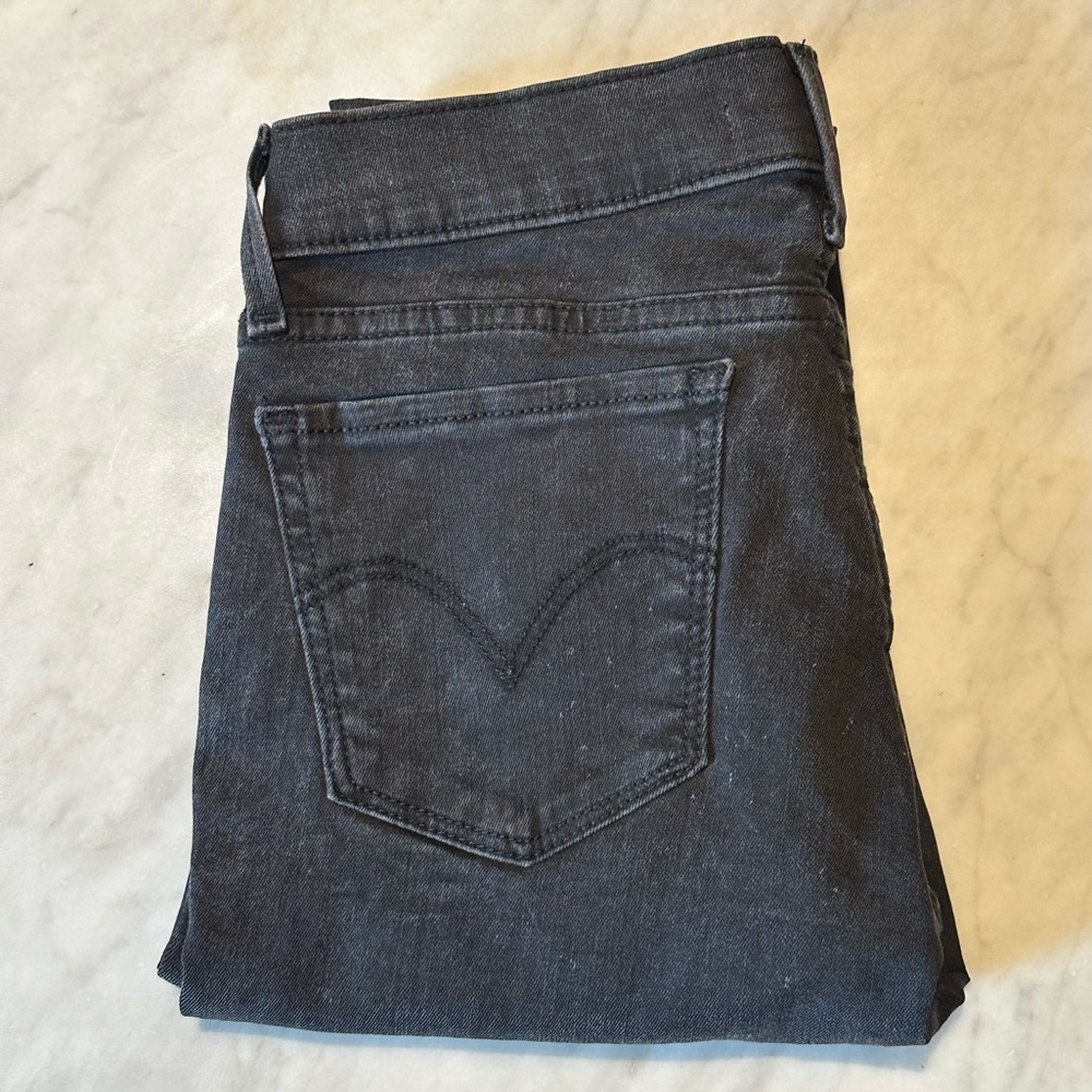 Levi’s 710 Black Distressed Super Skinny Jeans